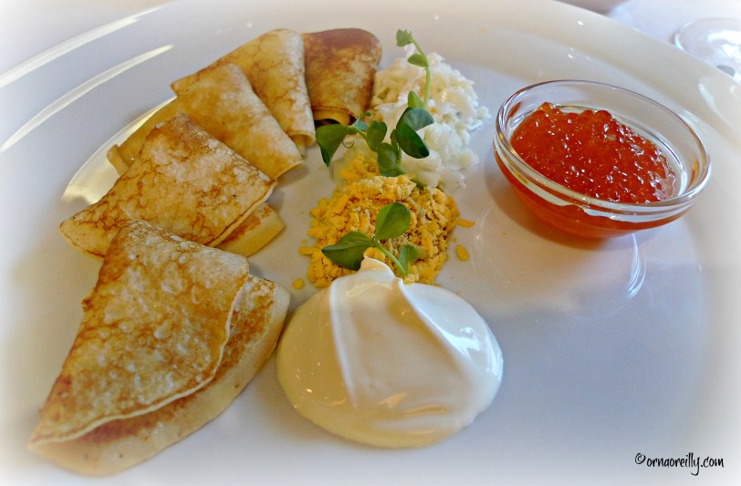 Blinis with caviar and sour cream